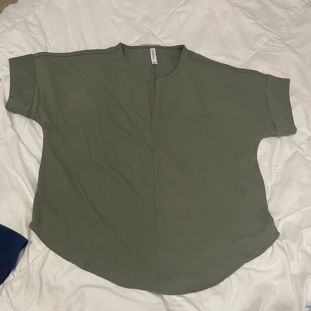 Curved hem blouse